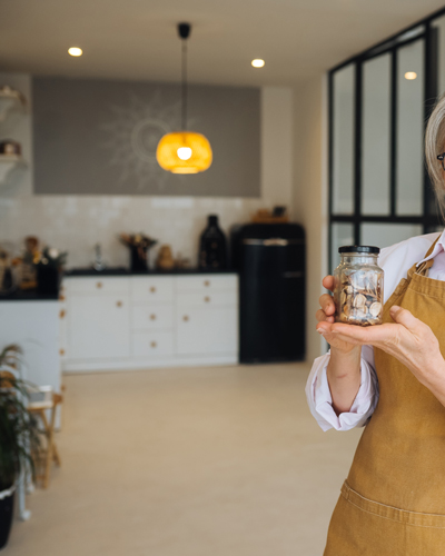 Supernal Companion Agency's Caregiver holding recepies ready to prepare a meal for an elder