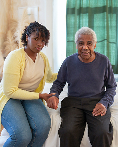 Supernal Companion Agency's Caregiver offering reading assistance, care and assistance to an elder